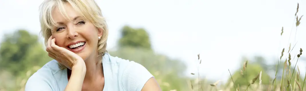 Dentist Eden UT Woman Facing Right And Smiling EMFACE